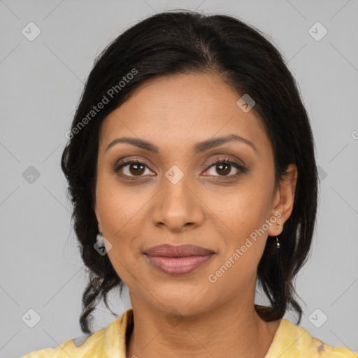 Joyful latino young-adult female with medium  brown hair and brown eyes