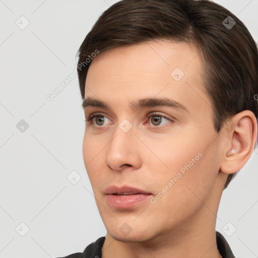 Neutral white young-adult male with short  brown hair and brown eyes