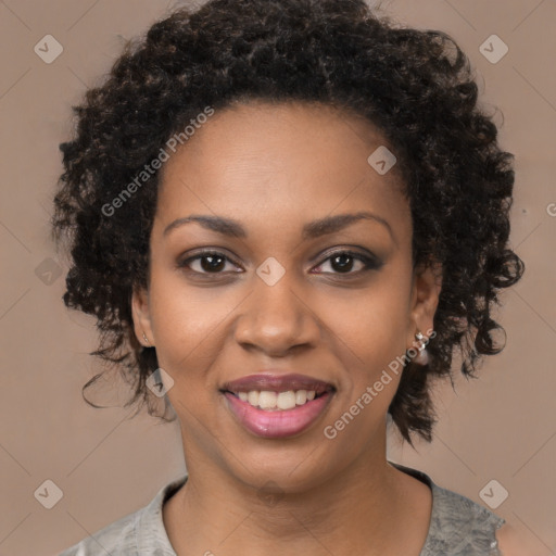 Joyful black young-adult female with medium  black hair and brown eyes