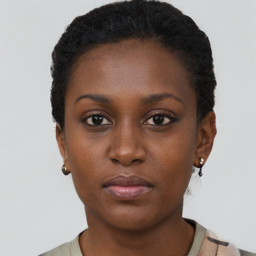 Neutral black young-adult female with short  black hair and brown eyes
