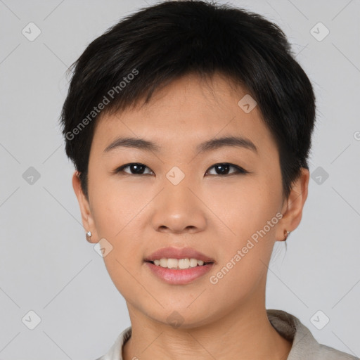 Joyful asian young-adult female with short  black hair and brown eyes