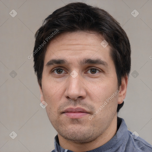 Neutral white adult male with short  black hair and brown eyes