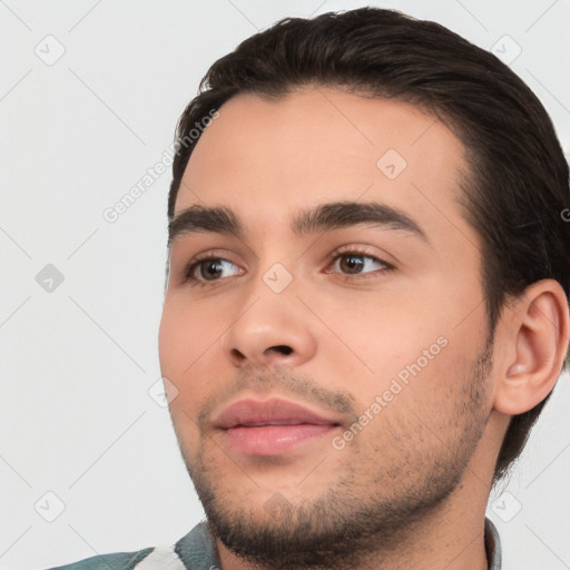 Neutral white young-adult male with short  black hair and brown eyes