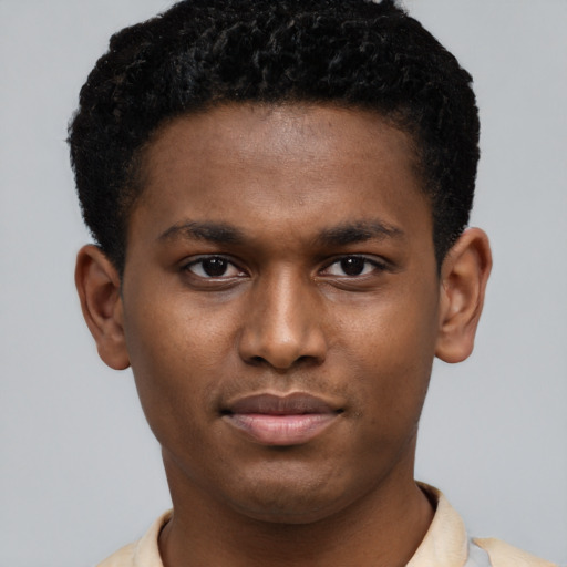 Neutral latino young-adult male with short  brown hair and brown eyes