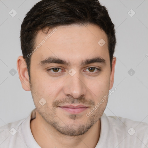 Joyful white young-adult male with short  brown hair and brown eyes