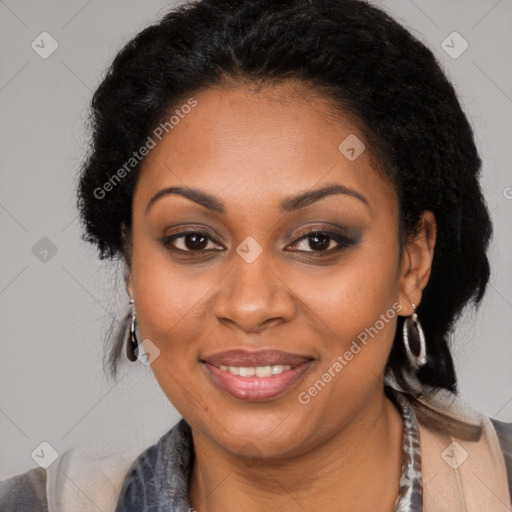 Joyful black young-adult female with long  black hair and brown eyes