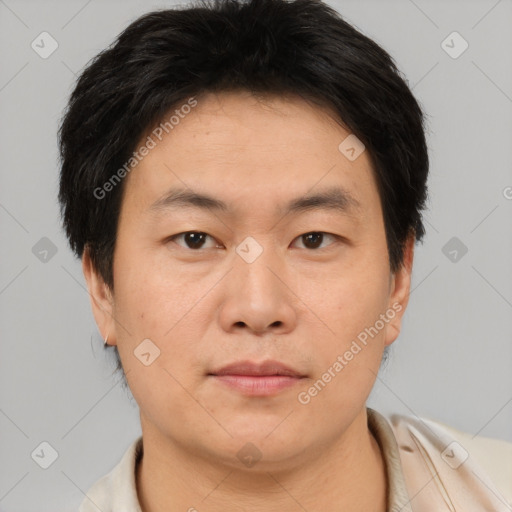 Neutral asian young-adult male with short  brown hair and brown eyes