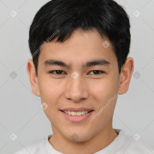 Joyful asian young-adult male with short  brown hair and brown eyes