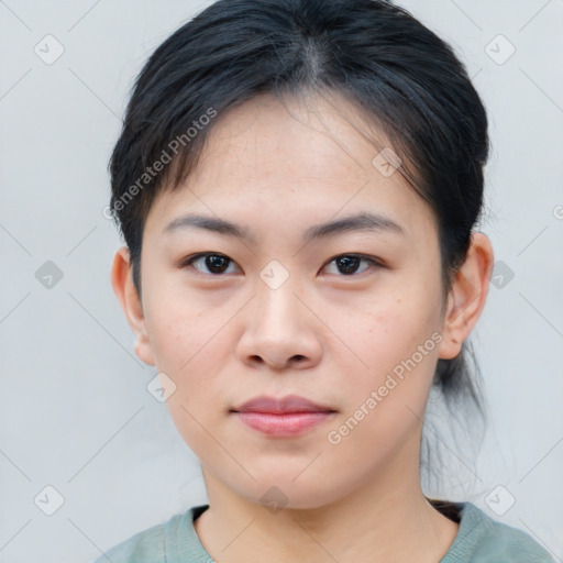 Neutral asian young-adult female with medium  brown hair and brown eyes