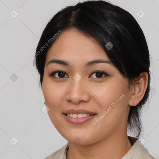 Joyful asian young-adult female with medium  black hair and brown eyes