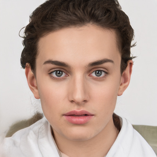 Neutral white young-adult female with short  brown hair and brown eyes