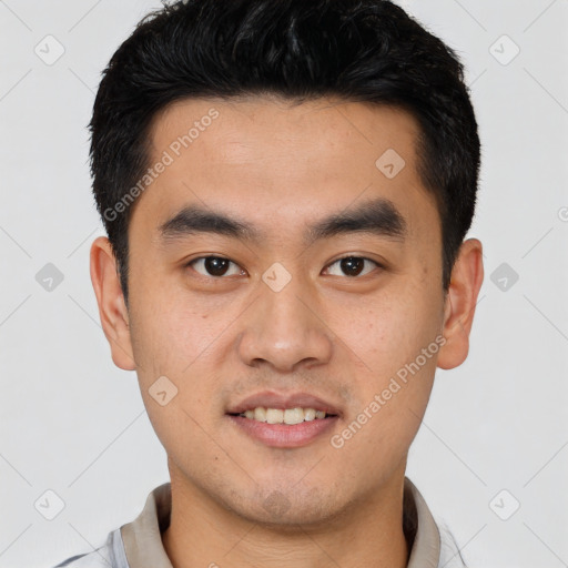 Joyful latino young-adult male with short  black hair and brown eyes