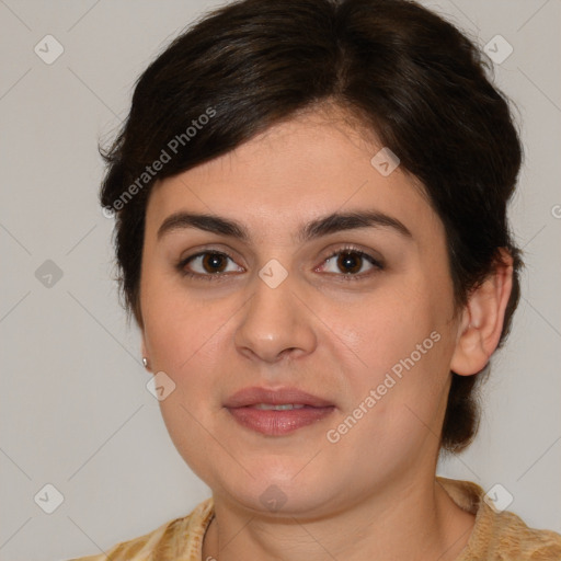 Joyful white young-adult female with medium  brown hair and brown eyes