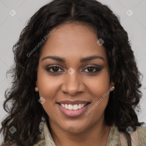 Joyful black young-adult female with long  brown hair and brown eyes