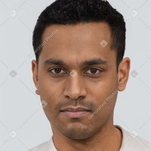 Neutral latino young-adult male with short  black hair and brown eyes