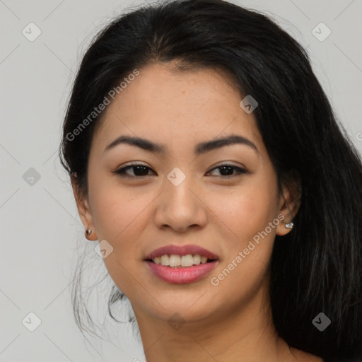 Joyful asian young-adult female with long  brown hair and brown eyes