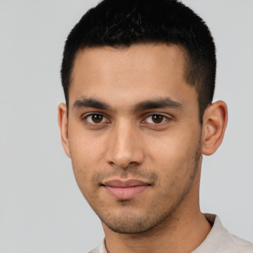 Neutral latino young-adult male with short  brown hair and brown eyes