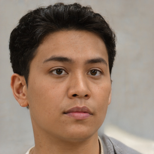 Neutral asian young-adult male with short  brown hair and brown eyes
