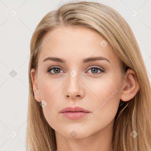 Neutral white young-adult female with long  brown hair and brown eyes