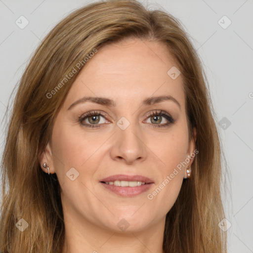 Joyful white young-adult female with long  brown hair and green eyes