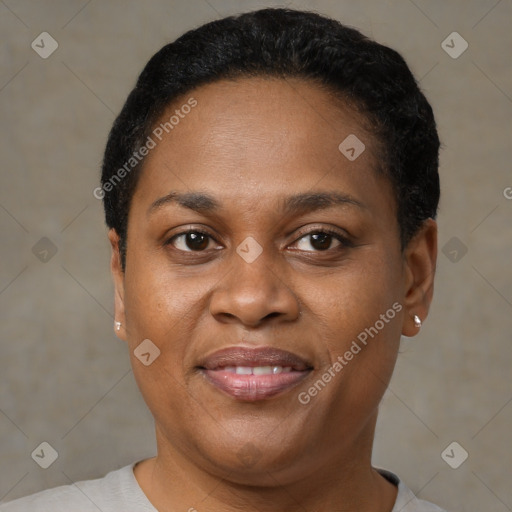 Joyful black young-adult female with short  brown hair and brown eyes