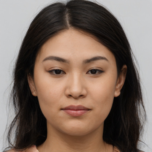 Neutral asian young-adult female with long  brown hair and brown eyes