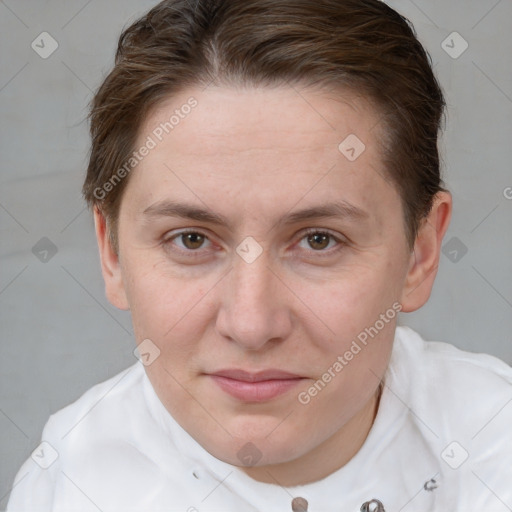 Joyful white adult female with short  brown hair and grey eyes