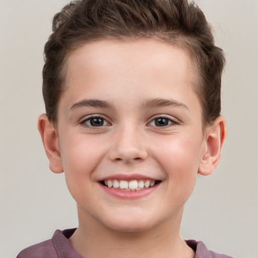 Joyful white child female with short  brown hair and brown eyes