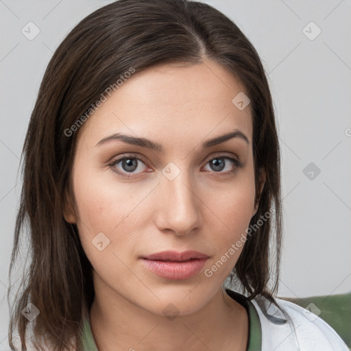 Neutral white young-adult female with medium  brown hair and brown eyes