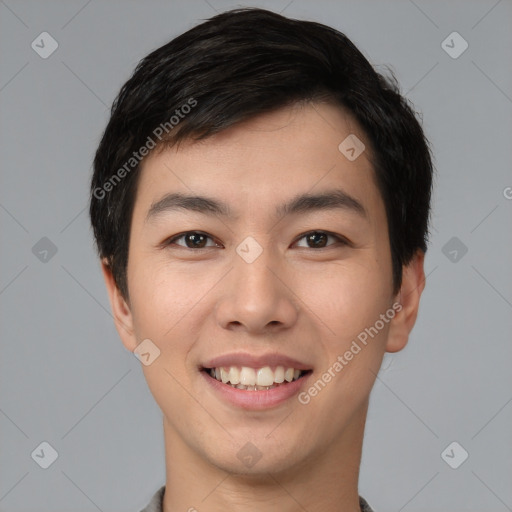 Joyful asian young-adult male with short  black hair and brown eyes