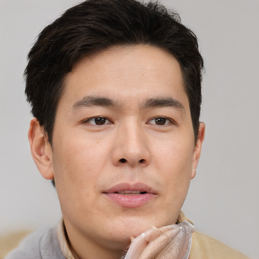 Neutral asian young-adult male with short  brown hair and brown eyes