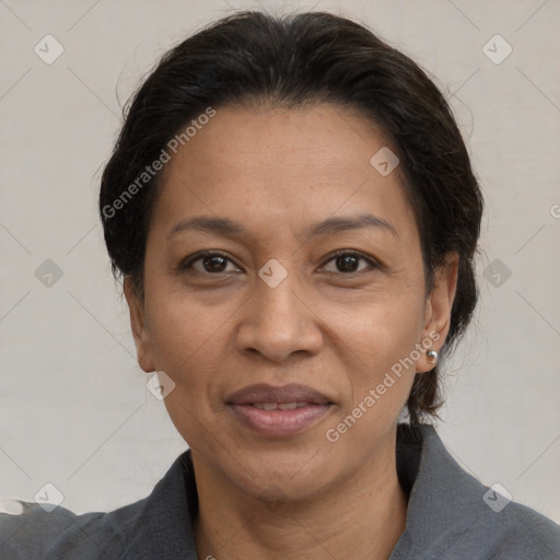 Joyful white adult female with medium  brown hair and brown eyes