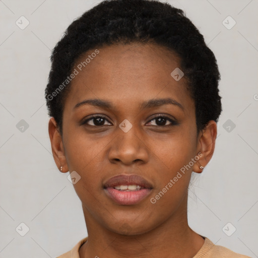 Joyful black young-adult female with short  black hair and brown eyes