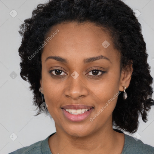 Joyful black young-adult female with medium  black hair and brown eyes