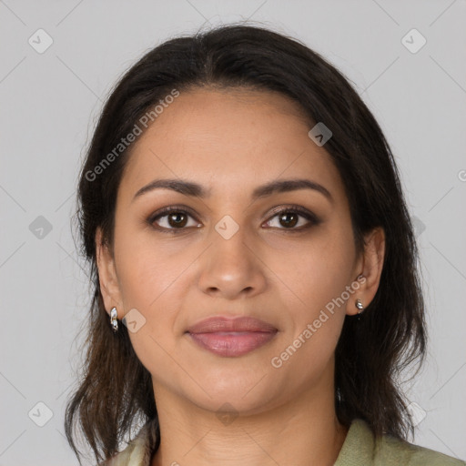 Joyful latino young-adult female with medium  brown hair and brown eyes