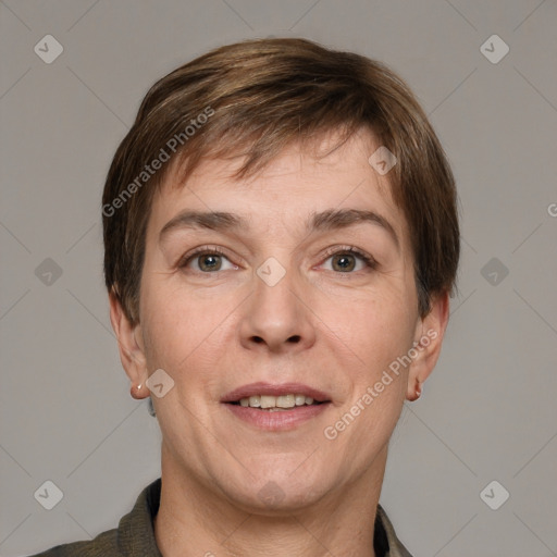 Joyful white adult male with short  brown hair and grey eyes