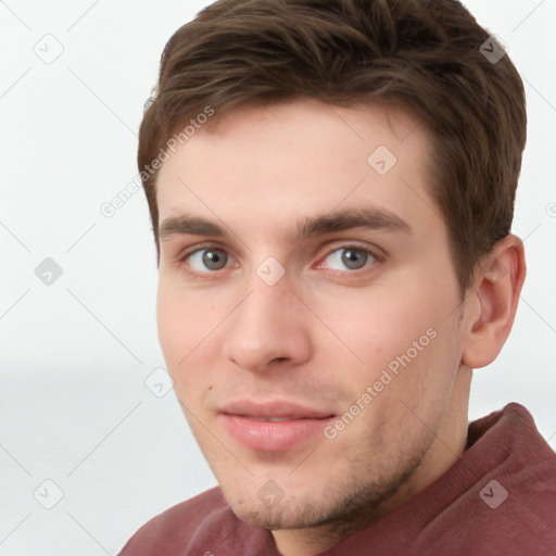 Neutral white young-adult male with short  brown hair and grey eyes