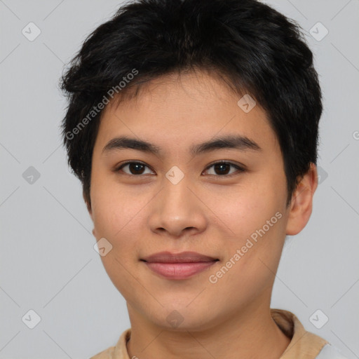 Joyful asian young-adult male with short  brown hair and brown eyes