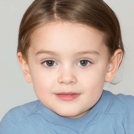 Joyful white child female with short  brown hair and brown eyes