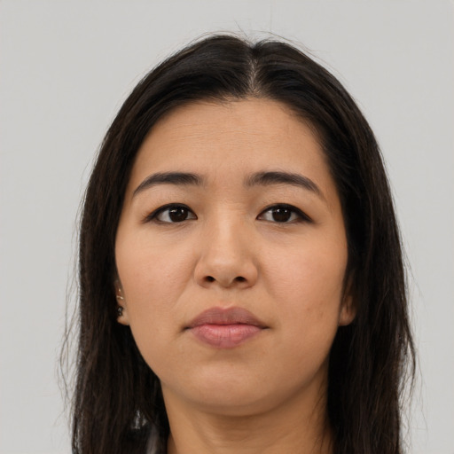 Neutral latino young-adult female with long  brown hair and brown eyes
