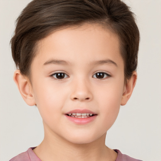 Joyful white child female with short  brown hair and brown eyes