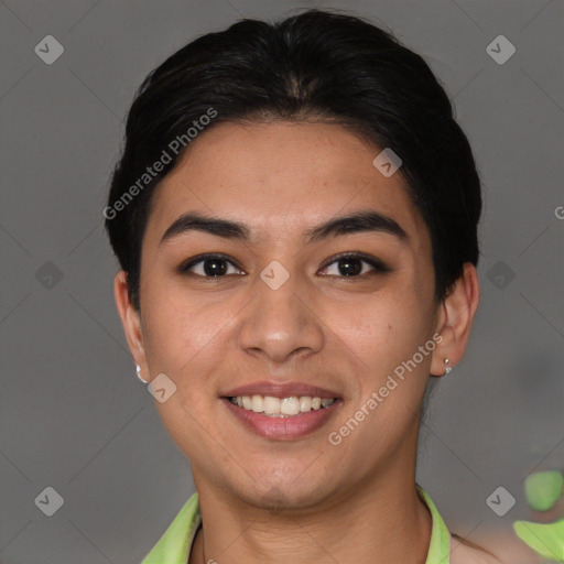 Joyful asian young-adult female with short  brown hair and brown eyes