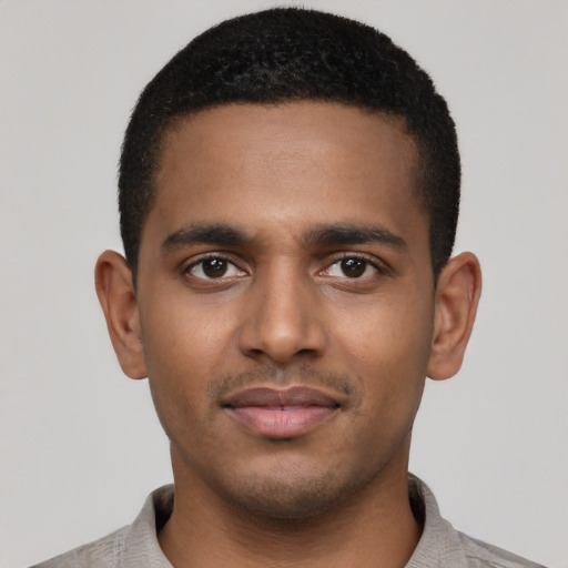 Neutral black young-adult male with short  black hair and brown eyes