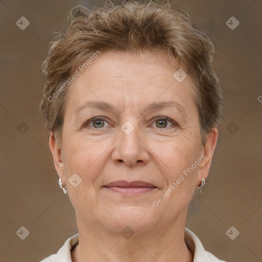 Joyful white adult female with short  brown hair and brown eyes