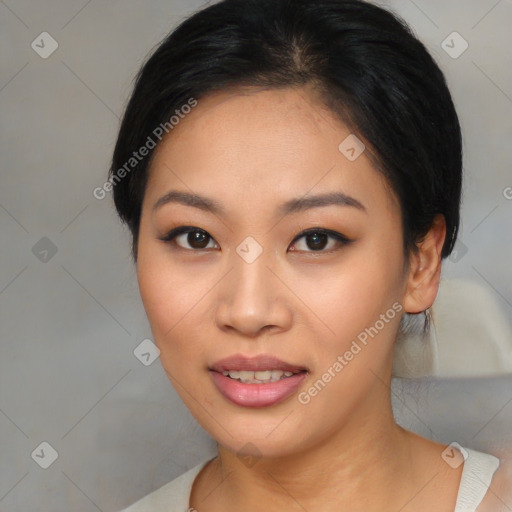 Joyful asian young-adult female with medium  black hair and brown eyes