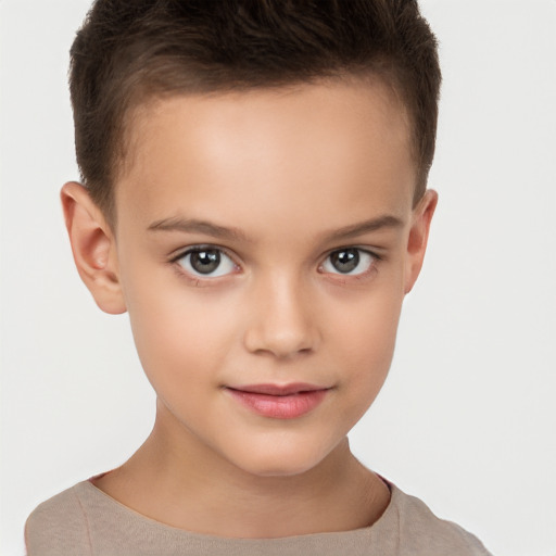 Joyful white child female with short  brown hair and brown eyes