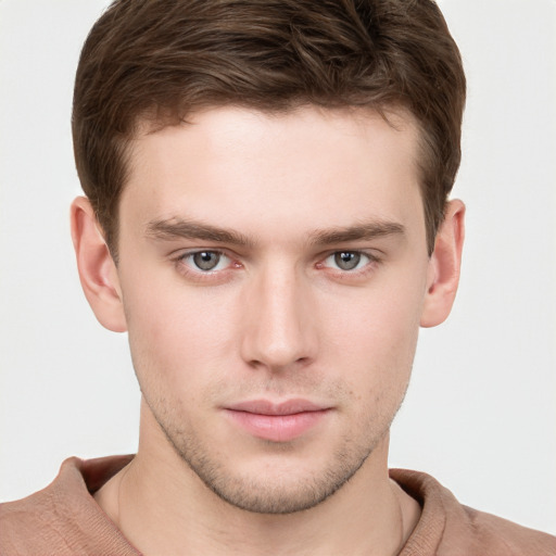 Neutral white young-adult male with short  brown hair and grey eyes