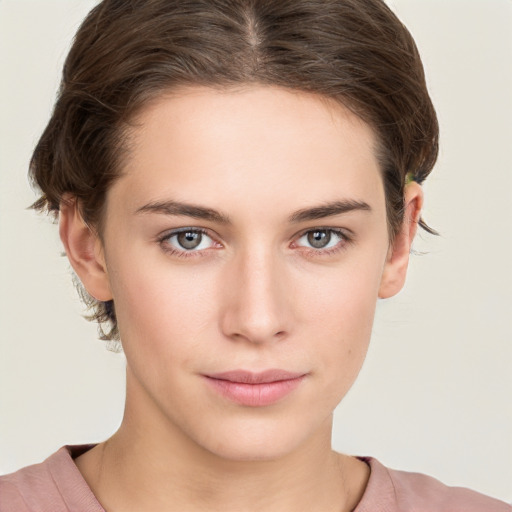 Neutral white young-adult female with short  brown hair and brown eyes