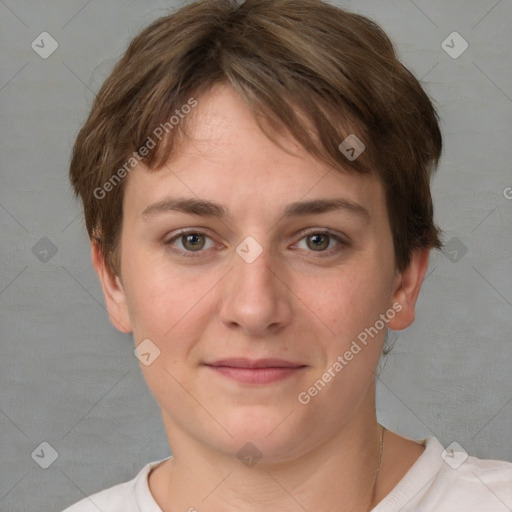 Joyful white young-adult female with short  brown hair and grey eyes