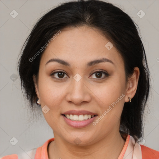 Joyful latino young-adult female with medium  brown hair and brown eyes